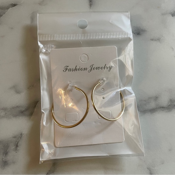 Clip on 1.5 inch gold hoop earrings - Picture 2 of 2